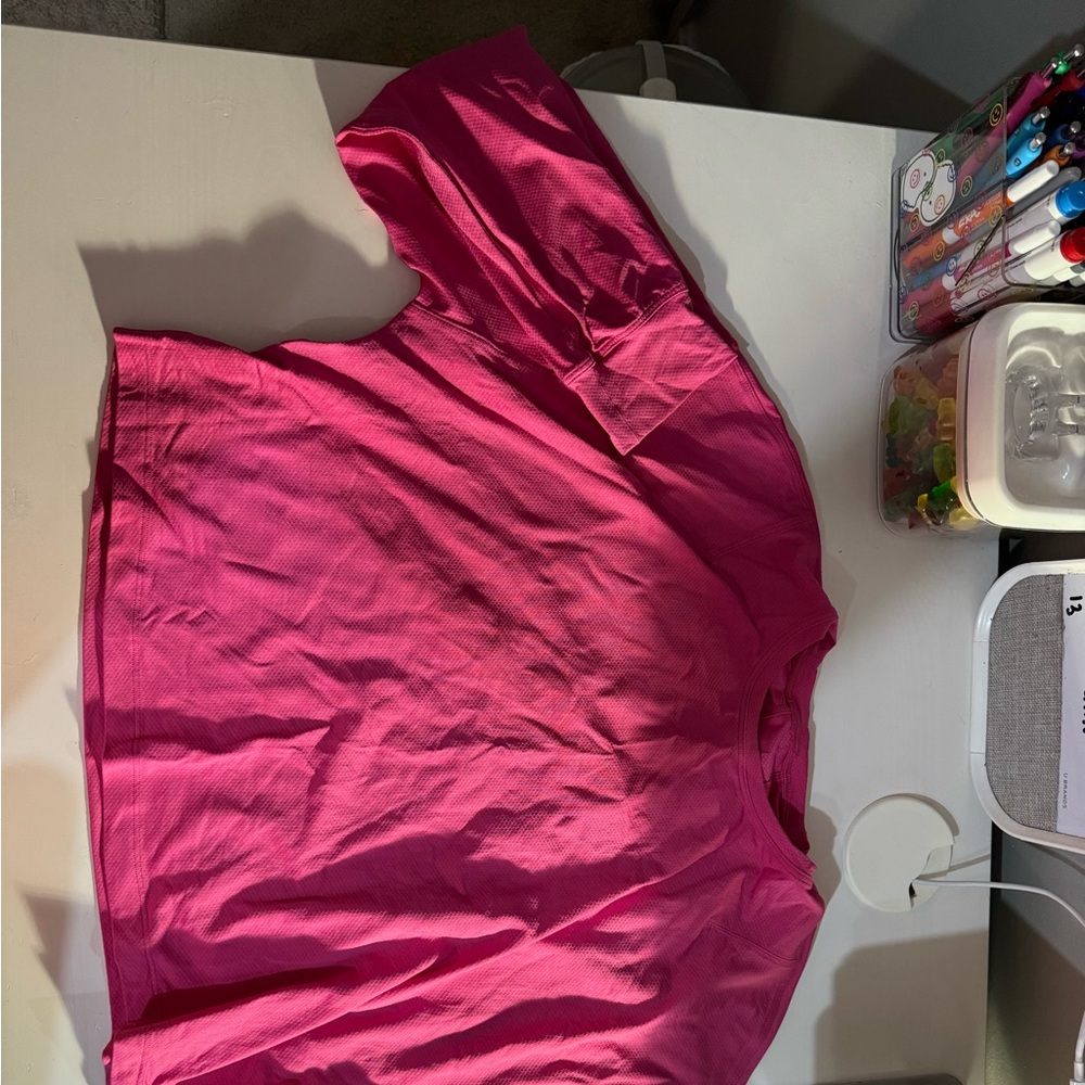 sonic pink size 6 lululemon cropped long sleeve top